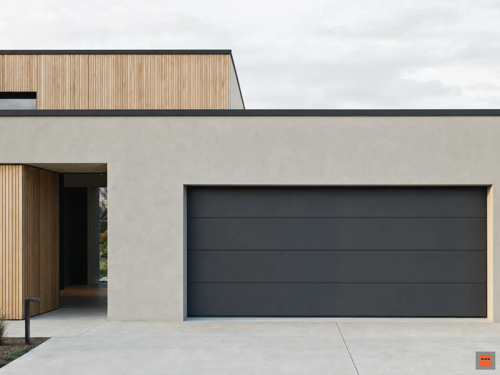 Porte de garage sectionnelle sur mesure à surface lisse